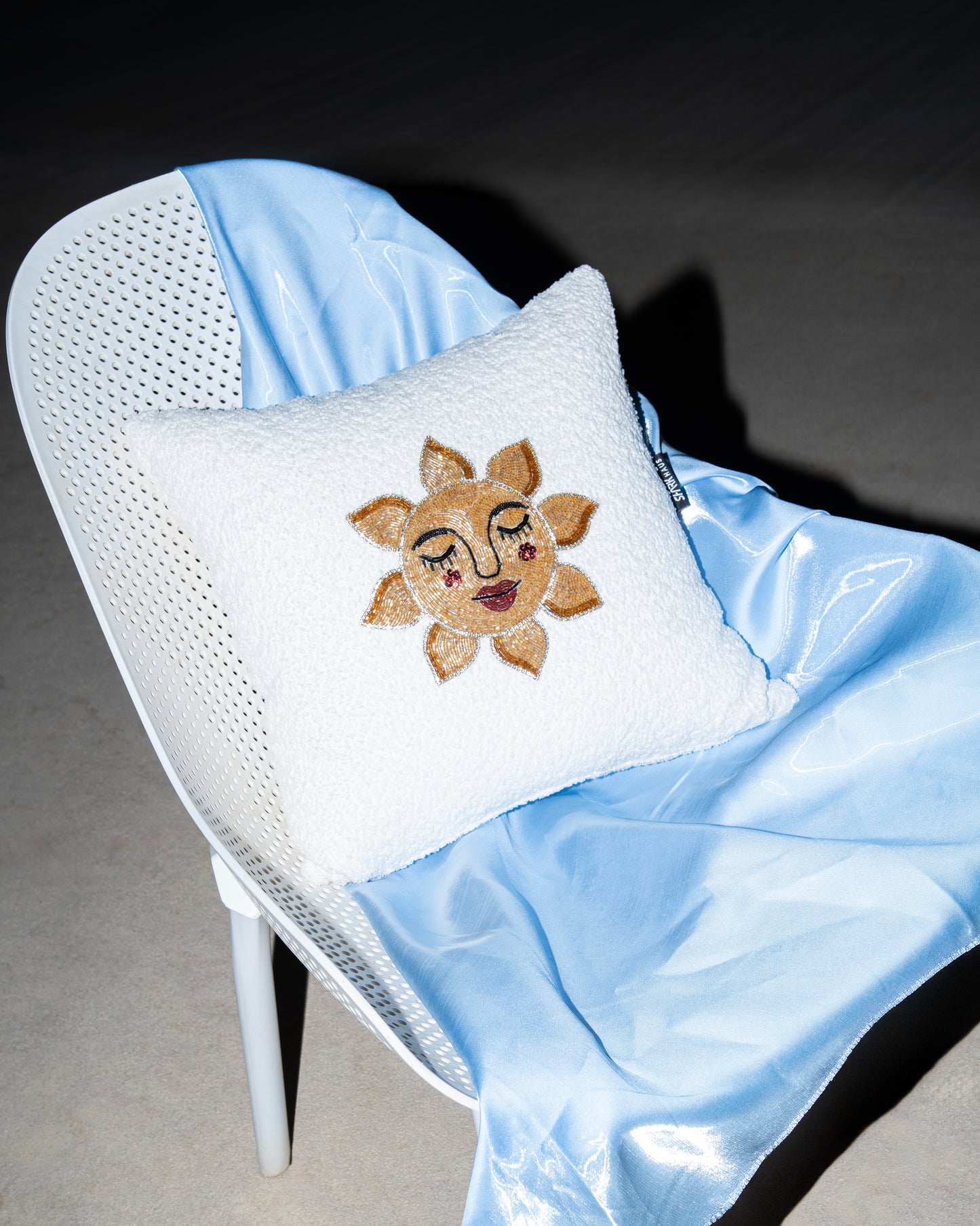 Stitched cushion sun